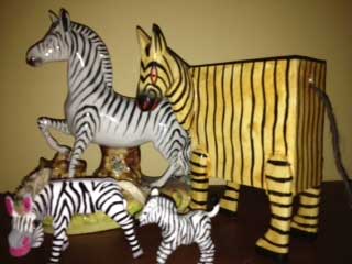 a collection of toy zebras