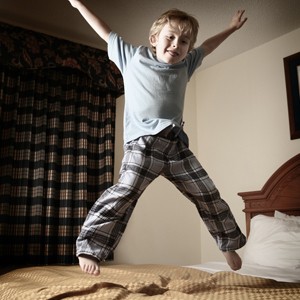 kid-jumping-on-bed-picture